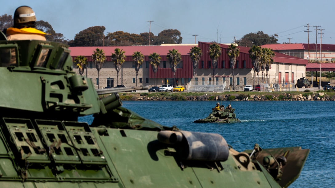 U.S. Marines with Light Armored Reconnaissance Training Company, Advanced Infantry Training Battalion, School of Infantry - West, operate a LAV-25 Light Armored Vehicle during LAR Marine Course 2-20’s LAV swim operations at the Del Mar boat basin on Marine Corps Base Camp Pendleton, California, Feb. 11, 2020. The mission of LARTC is to train entry-level light armored reconnaissance crewmen in the tactical employment of the LAV. (U.S. Marine Corps photo by Lance Cpl. Melissa I. Ugalde)