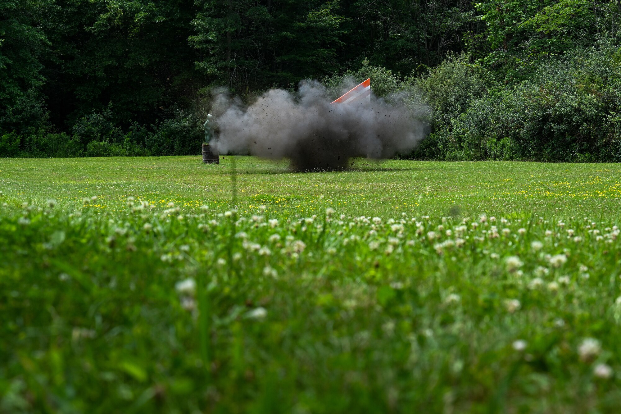 A grenade detonates during the Air Force Reserve Command Integrated Defense Leadership Course on July 21, 2023, at Camp James A. Garfield Joint Military Training Center, Ohio.