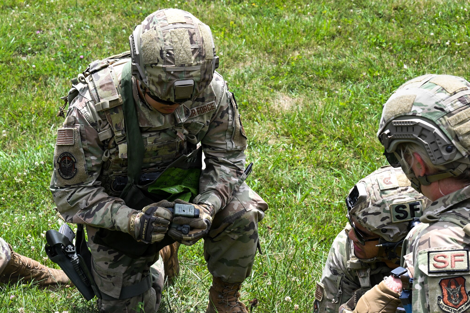 Senior Airman Andrew Trinh, a Defender assigned to the 920th Security Forces Squadron, prepares to detonate a claymore on July 21, 2023, at Camp James A. Garfield Joint Military Training Center, Ohio.