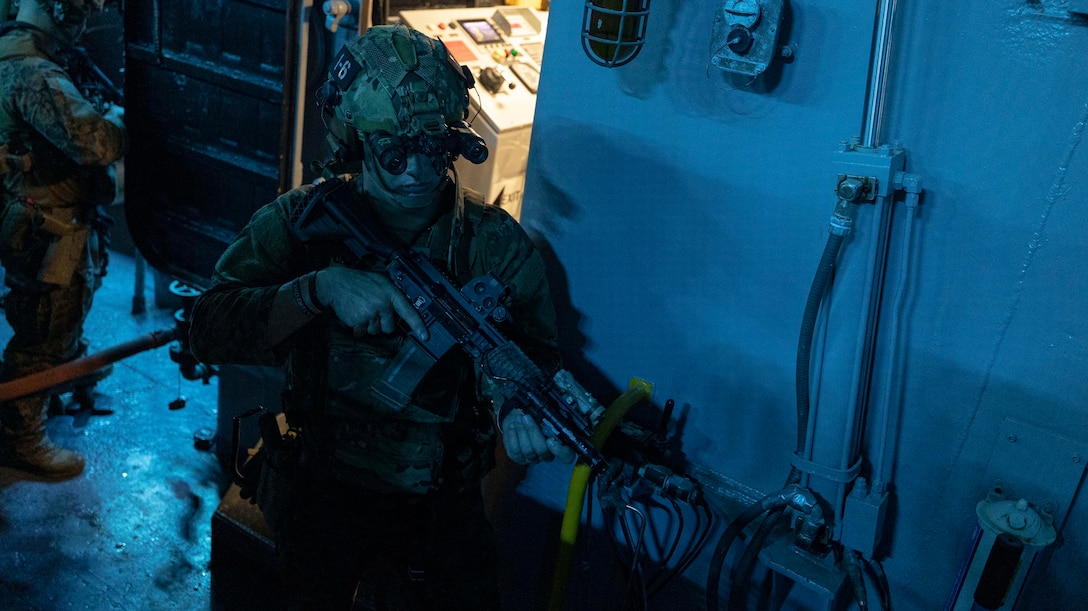A U.S. Marine with the 26th Marine Expeditionary Unit (Special Operations Capable)’s Maritime Special Purpose Force sets security during training aboard the Wasp-class amphibious assault ship USS Bataan (LHD 5), Mediterranean Sea, July 31, 2023. The 26th MEU(SOC), embarked with the Bataan Amphibious Ready Group, continues to maximize training opportunities across the Marine Air-Ground Task Force while on a scheduled deployment as the Tri-Geographic Combatant Command Immediate Response Force within the Fifth and Sixth Fleet’s area of responsibility.