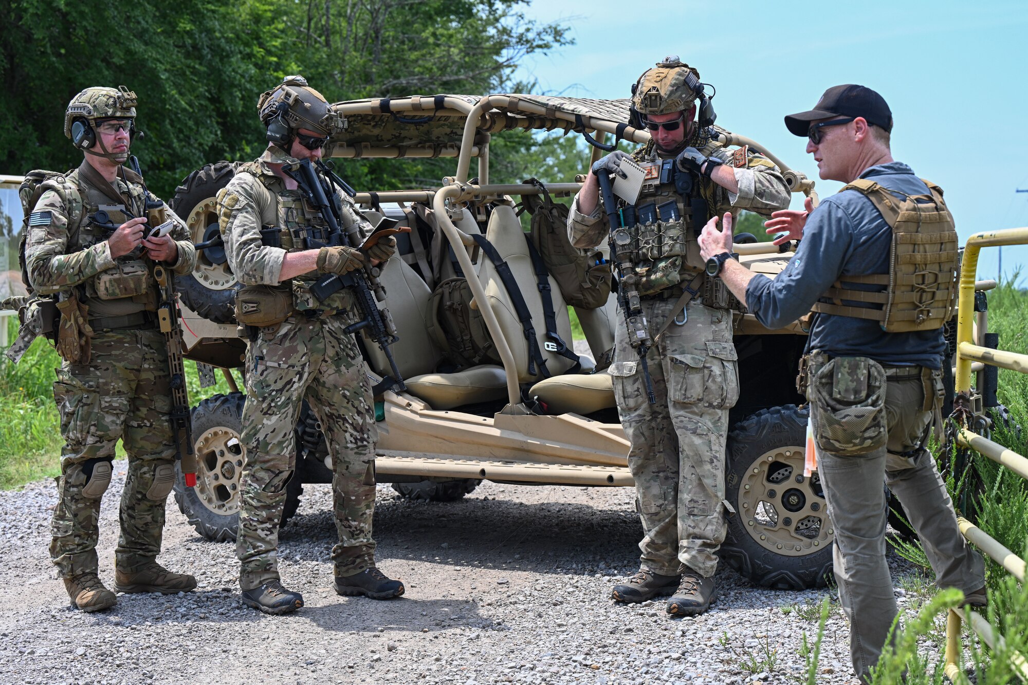 EOD Airmen take notes.