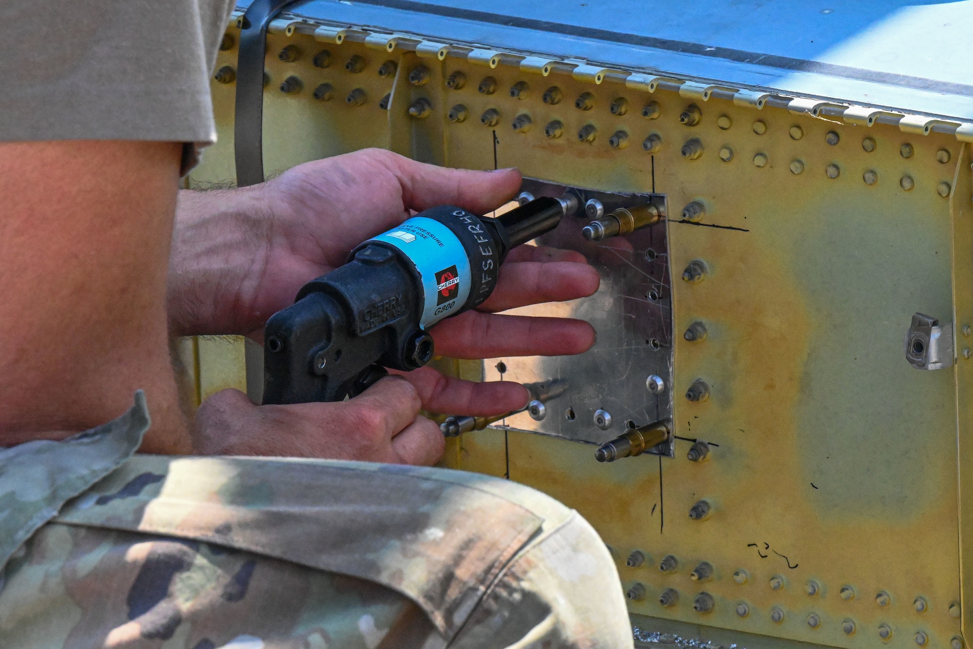 An Airmen repairs a simulated wing.