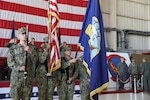 The Navy Reserve Center North Island presents the colors during the national anthem at the deactivation ceremony for Helicopter Sea Combat Squadron (HSC) 85 in the squadrons hangar on Naval Base Coronado.