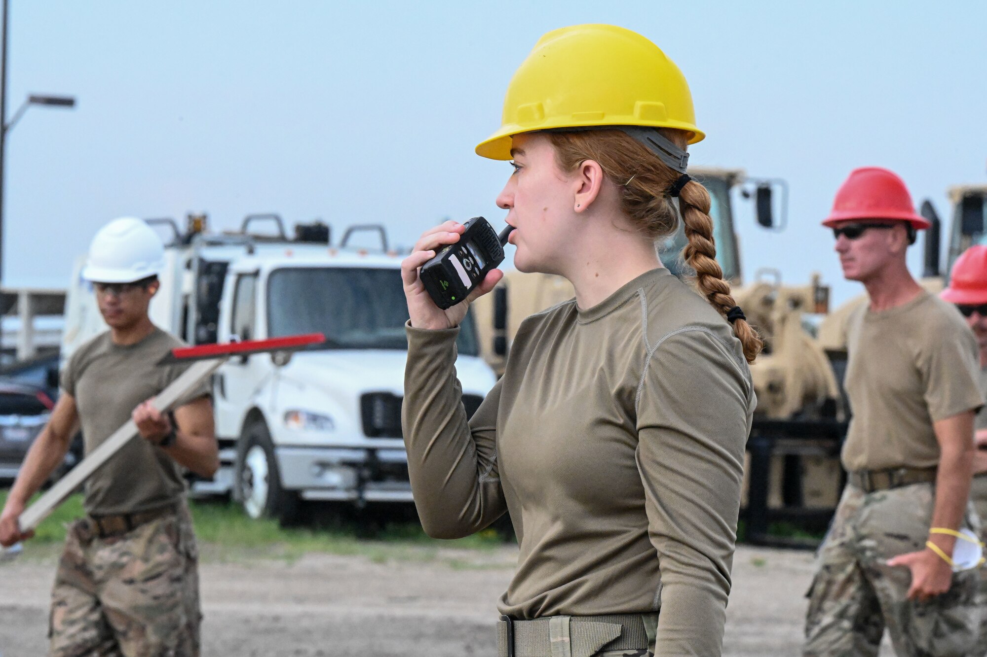 An Airmen talks over a radio.