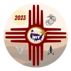 The graphic logo for the New Mexico Joint Innovative Readiness Training exercise. The graphic depicts the emblems for the Marine Corps, Air Force, and Space Force. The Zia sun symbol runs across the graphic, an image sacred to the Pueblo people of New Mexico.