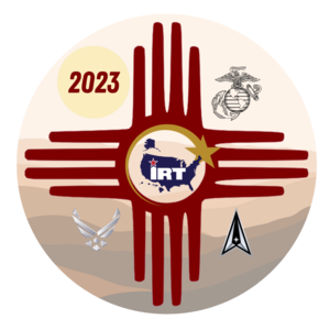 The graphic logo for the New Mexico Joint Innovative Readiness Training exercise. The graphic depicts the emblems for the Marine Corps, Air Force, and Space Force. The Zia sun symbol runs across the graphic, an image sacred to the Pueblo people of New Mexico.