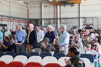Veterans who served with previously-deactivated squadrons that provided special warfare and/or search and rescue support stand for recognition during the deactivation ceremony of Helicopter Sea Combat Squadron (HSC) 85.