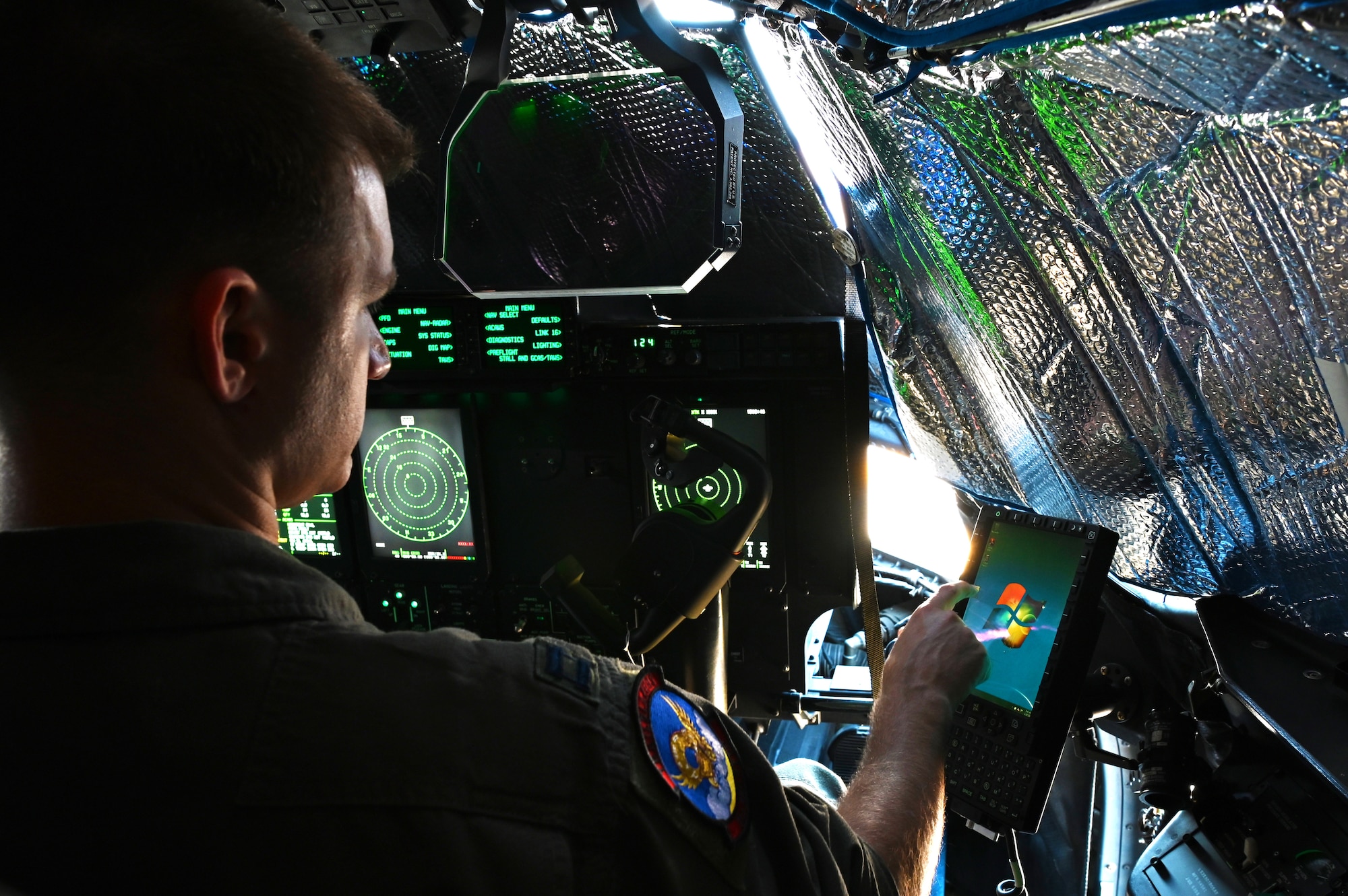 U.S. Air Force Capt. Gregg Burrow, 39th Airlift Squadron assistant director of operations, tests new data link technology on a C-130J Super Hercules at Dyess Air Force Base, Texas, June 26, 2023. The C-130s are undergoing Block 8.1 upgrades to help pilots, loadmasters and maintenance personnel by providing enhanced mission capabilities using modern technologies. (U.S. Air Force photo by Airman 1st Class Emma Anderson)