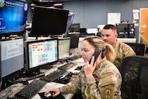 Soldier looks at air picture on a monitor