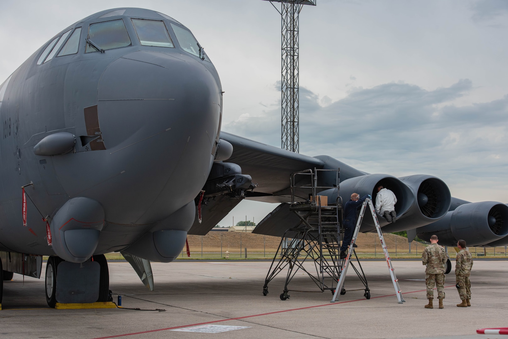 Airmen, assigned to the 5th Aircraft Maintenance Squadron, inspect the intake of a B-52H Stratofortress engine during the Global Strike Challenge at Minot Air Force Base, North Dakota, Aug. 4, 2023. Each of the B-52H Stratofortress’ eight engines can produce up to 17,000 pounds of thrust. (U.S. Air Force photo by Airman 1st Class Kyle Wilson)