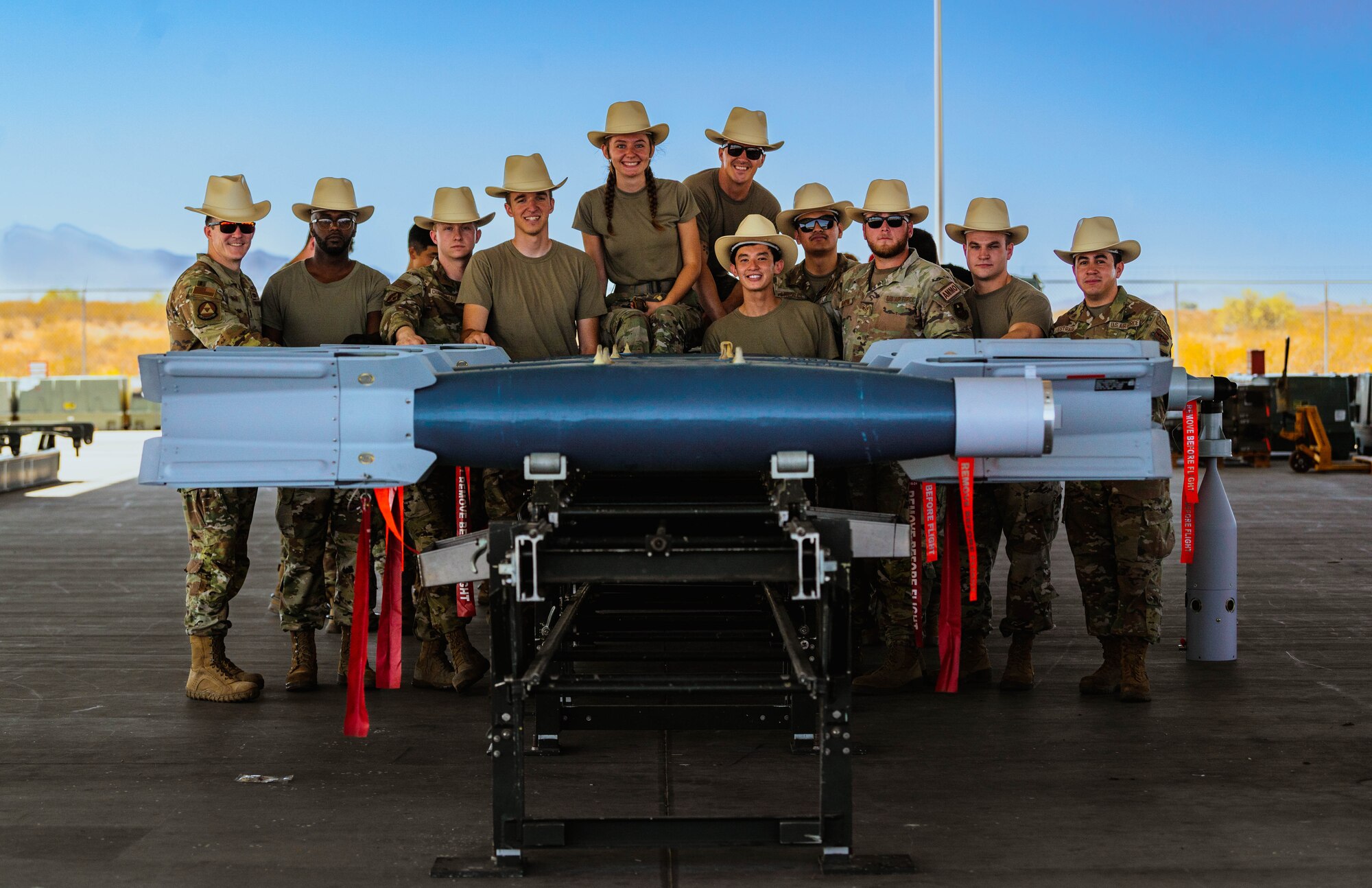 U.S. Air Force Airmen from the 56th Equipment Maintenance Squadron, pose for a photo after a training exercise in preparation for this year’s Air Force Combat Operation Competition.