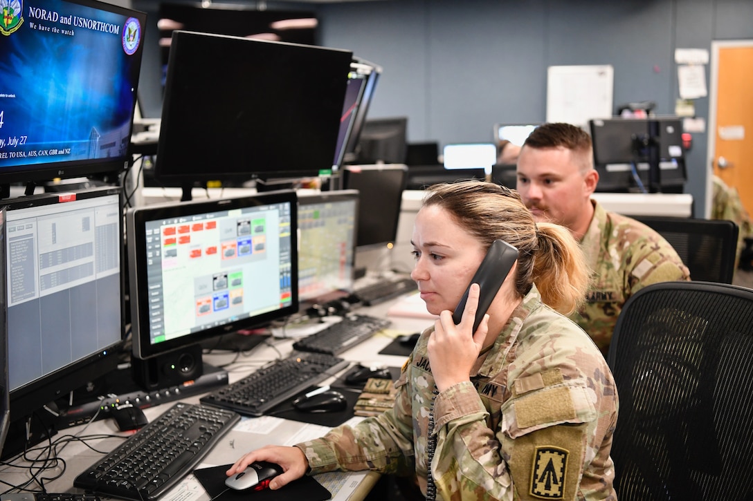 Soldier looks at air picture on a monitor