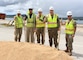 NAVAL BASE GUAM  (Aug. 9, 2023) - Joint Region Marianas Chief-of-Staff Capt. Michael Smith, U.S. Naval Base (NBG) Commanding Officer Capt. Michael Luckett, Naval Facilities Engineering Systems Command (NAVFAC) Marianas Commanding Officer Capt. Troy Brown, NAVFAC Marianas Facilities Engineering and Acquisition Division (FEAD) Director Lt. Cmdr. Ryan Sawyer, and Senior Project Manager Chuck Lowther broke ground at the site of the Mike and November wharves, onboard NBG Aug. 8. 

Pictured from left to right: Luckett, Lowther, Smith, Brown, and Sawyer. NAVFAC Marianas awarded a $138 million firm-fixed-price contract to H2O Guam, JV, Aiea, Hawaii to repair the wharves.