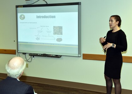JOINT BASE SAN ANTONO-FORT SAM HOUSTON – (Aug. 2, 2023) – Cornell University senior Victoria Capobianco, of Scarsdale, N.Y., an intern assigned to Naval Medical Research Unit (NAMRU) San Antonio, delivers her briefing titled “Development of Hemostatic and Antibacterial Co-Crystal for Wound Healing” to her mentor, Dr. Daniel W. Thompson, NAMRU San Antonio leadership and other researchers as part of the Office of Naval Research’s Naval Research Enterprise Internship Program (NREIP) at the Battlefield Health and Trauma Research Institute. NREIP places college and university students in the Department of the Navy laboratories where they take part in real Naval research for ten weeks during the summer. NREIP gives academically talented college students, graduating seniors, and graduate students pursuing STEM careers the opportunity to learn about Naval research and technology while receiving first-class mentoring by top scientists and engineers. NAMRU San Antonio is one of the leading research and development laboratories for the U.S. Navy under the Department of Defense (DoD) and is one of eight subordinate research commands in the global network of laboratories operating under the Naval Medical Research Command in Silver Spring, Md.  Its mission is to conduct gap driven combat casualty care, craniofacial, and directed energy research to improve survival, operational readiness, and safety of DoD personnel engaged in routine and expeditionary operations. (U.S. Navy photo by Burrell Parmer, NAMRU San Antonio Public Affairs/Released)