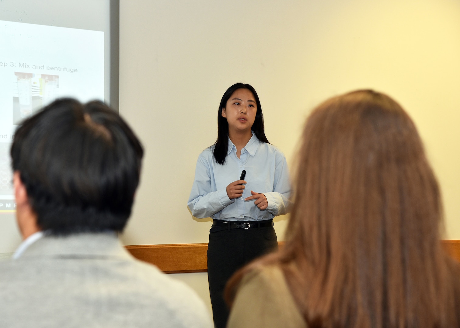 JOINT BASE SAN ANTONO-FORT SAM HOUSTON – (Aug. 2, 2023) – University of Texas at Austin junior Saeha Lee, of Dallas, an intern assigned to Naval Medical Research Unit (NAMRU) San Antonio, delivers her briefing titled “Relative Cytotoxicity of Brands of Tricalcium Silicate-based Sealers” to her mentor, Lt. Cmdr. William Arden, NAMRU San Antonio leadership and other researchers as part of the Office of Naval Research’s Naval Research Enterprise Internship Program (NREIP) at the Battlefield Health and Trauma Research Institute. NREIP places college and university students in the Department of the Navy laboratories where they take part in real Naval research for ten weeks during the summer. NREIP gives academically talented college students, graduating seniors, and graduate students pursuing STEM careers the opportunity to learn about Naval research and technology while receiving first-class mentoring by top scientists and engineers. NAMRU San Antonio is one of the leading research and development laboratories for the U.S. Navy under the Department of Defense (DoD) and is one of eight subordinate research commands in the global network of laboratories operating under the Naval Medical Research Command in Silver Spring, Md.  Its mission is to conduct gap driven combat casualty care, craniofacial, and directed energy research to improve survival, operational readiness, and safety of DoD personnel engaged in routine and expeditionary operations. (U.S. Navy photo by Burrell Parmer, NAMRU San Antonio Public Affairs/Released)
