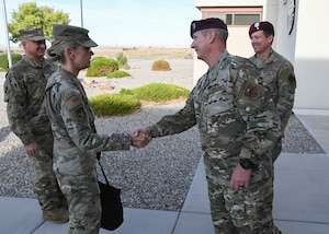 Two people shaking hands.