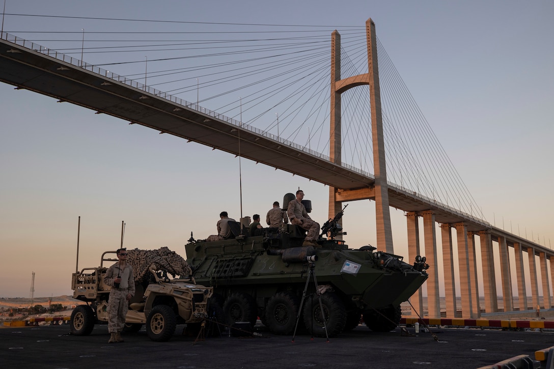A Light Armored Vehicle, electronic warfare variant is manned by Marines and Sailors in defense of the amphibious task force aboard the amphibious assault ship USS Bataan (LHD 5), while transiting the Suez Canal, Aug. 6, 2023. The Bataan Amphibious Ready Group and embarked 26th Marine Expeditionary Unit (Special Operations Capable), under the command and control of Task Force 51/5, is on a scheduled deployment in the U.S. Naval Forces Central Command area of operations, employed by U.S. Fifth Fleet to maintain maritime security and stability in the Middle East region.
