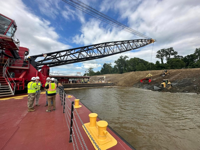 Memphis District Commander Col. Brian Sawser and several members of the district leadership team traveled to Mhoon Bend, Mississippi, on July 12, to visit the district's Bank Grading Unit team and observe the new bank grader, Grader 1, in action for the first time since its arrival and christening earlier this year. 

With this year’s revetment season now in full swing, the BGU is laser-focused on accomplishing two key objectives, with the first being training, both contractor-led and on-the-job, to attain the necessary certifications and practice according to each employees' role. 

Additionally, unit operators will use this first test site to calibrate the newly constructed machine, ensuring it's “put through the paces,” so to speak.



Additionally, unit operators will use this first test site to calibrate the newly constructed machine, ensuring it's “put through the paces,” so to speak.