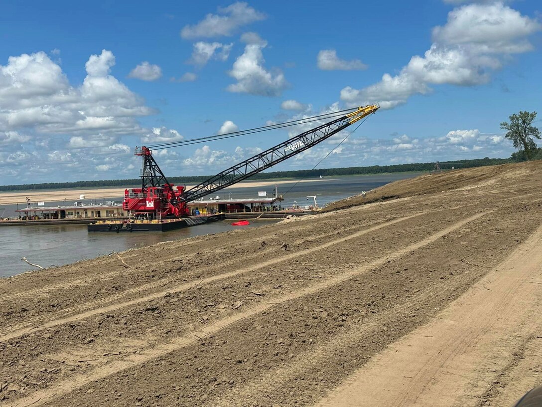 Memphis District Commander Col. Brian Sawser and several members of the district leadership team traveled to Mhoon Bend, Mississippi, on July 12, to visit the district's Bank Grading Unit team and observe the new bank grader, Grader 1, in action for the first time since its arrival and christening earlier this year. 

With this year’s revetment season now in full swing, the BGU is laser-focused on accomplishing two key objectives, with the first being training, both contractor-led and on-the-job, to attain the necessary certifications and practice according to each employees' role. 

Additionally, unit operators will use this first test site to calibrate the newly constructed machine, ensuring it's “put through the paces,” so to speak.


Additionally, unit operators will use this first test site to calibrate the newly constructed machine, ensuring it's “put through the paces,” so to speak.