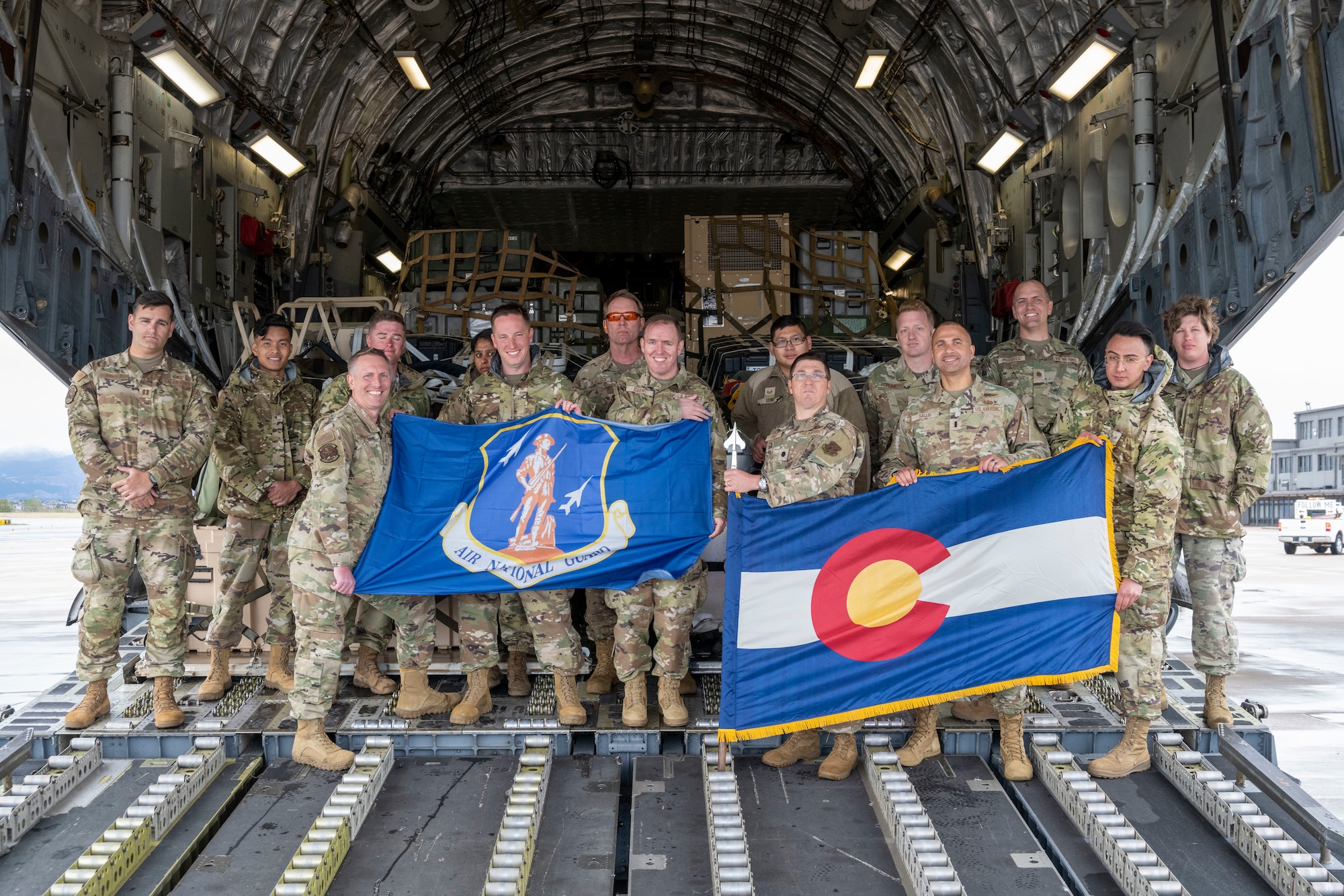 Airmen from the 138th Space Control Squadron, Peterson Air Force Base, Colorado Air National Guard, prepare to depart from Peterson Air Force Base to Washington, D.C., via an F-18 Globemaster courtesy of the 183rd Airlift Squadron, Mississippi Air National Guard, May 11, 2023.