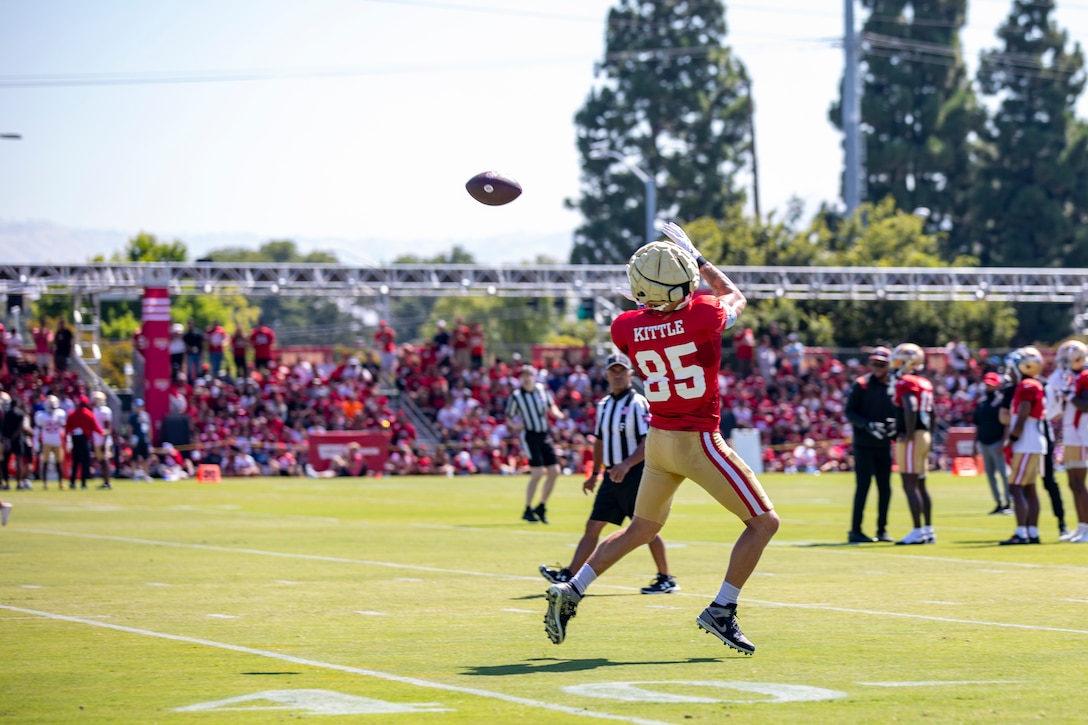 George Kittle, tight end for the San Francisco 49ers, catches a football during the 49ers Training Camp on Friday, Aug. 4, 2023. DLA photo by Julian Temblador.