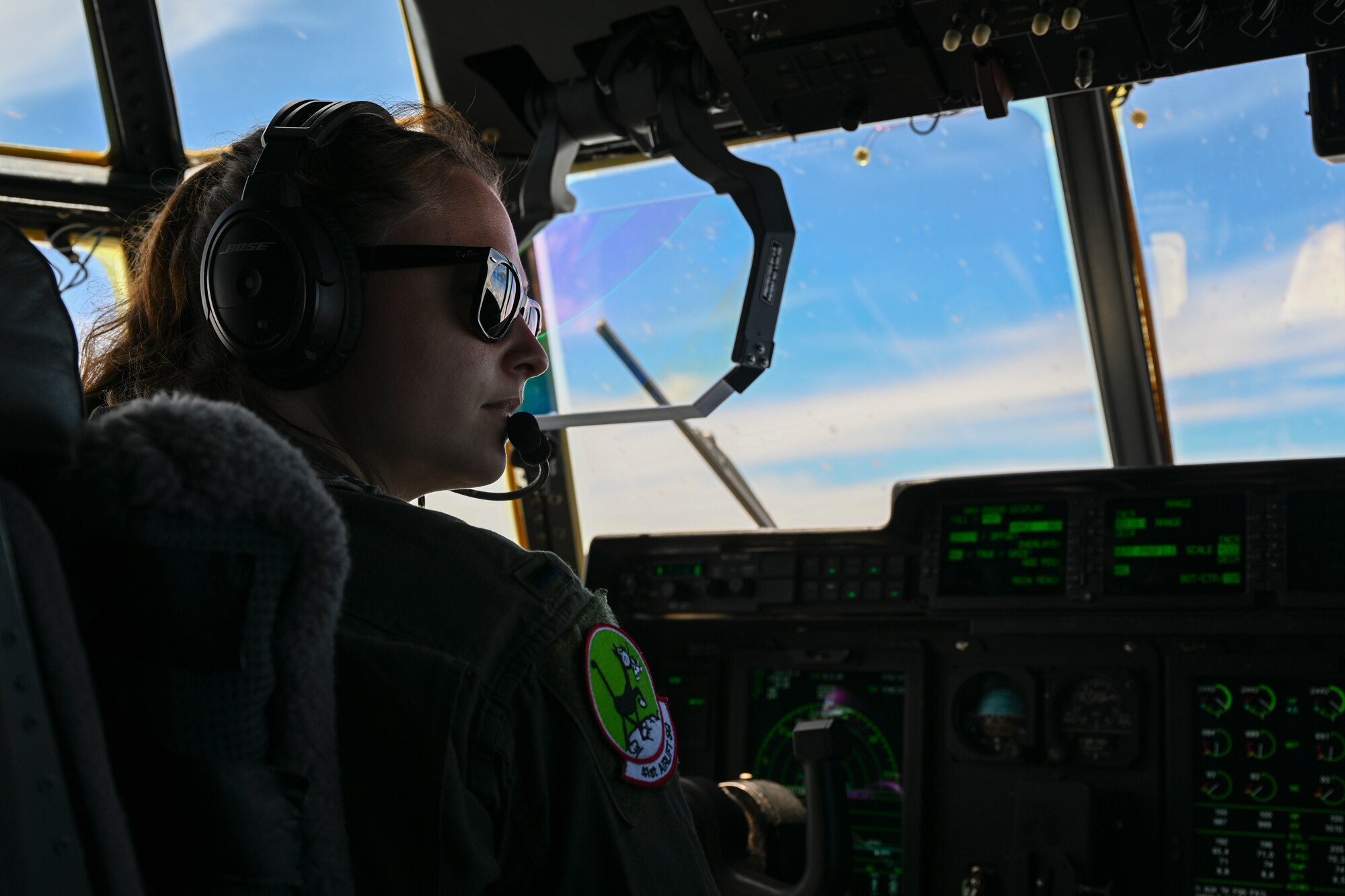1st Lt. Victoria Pleus, 41st Airlift Squadron pilot, flies a C-130J Super Hercules