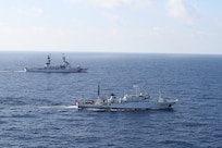 2012 - CGC Rush with China Fishery Law Enforcement Command Vessel