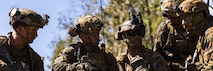 U.S. Marines with India Co., 3rd Battalion, 1st Marine Regiment (Reinforced), Marine Rotational Force – Darwin 23, discuss a patrol route during Exercise Talisman Sabre 23 at Proserpine, Queensland, Australia, July 31, 2023. Talisman Sabre is the largest bilateral military exercise between Australia and the United States, with multinational participation, advancing a free and open Indo-Pacific by strengthening relationships and interoperability among key Allies and enhancing our collective capabilities to respond to a wide array of potential security concerns. (U.S. Marine Corps photo by Cpl. Brayden Daniel)