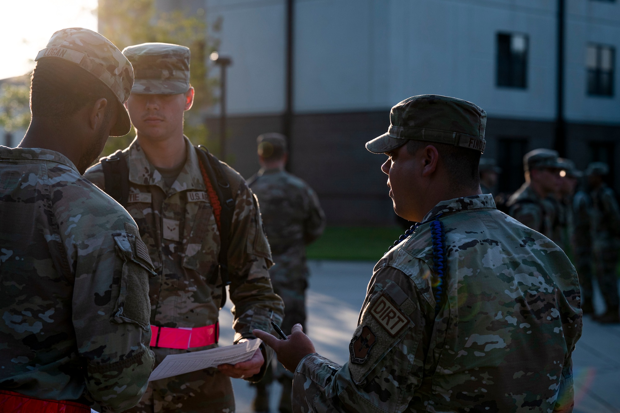 U.S. Air Force Staff Sgt. Austin Findley, 335th Training Squadron master military training leader, provides guidance to Airmen in training at Keesler Air Force Base, Mississippi, August 2, 2023. Findley deployed to Iraq twice at ages 19 and 20 in his career of pavement and construction equipment operation. (U.S. Air Force photo by Airman 1st Class Trenten Walters)