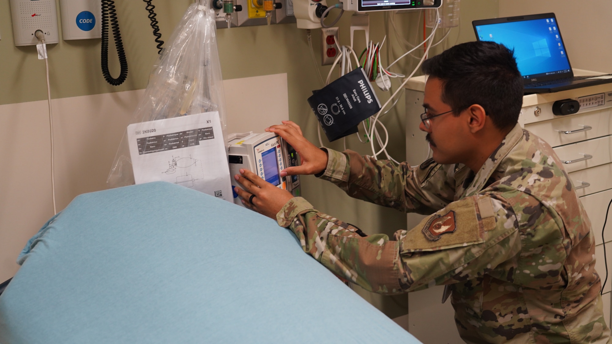 Airman 1st Class Lafayette Ragsdale, an 88th Medical Support Squadron biomedical equipment technician, checks an inventory update in the emergency room at Wright-Patterson Medical Center, June 29, 2023. The squadron helps “dominate the dirty work” for the 88th Medical Group, keeping daily operations on course while resourcing the Air Force’s second-largest hospital. (U.S. Air Force photo by Kenneth J. Stiles)