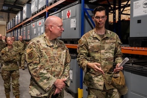The Air Force Medical Readiness Agency commander and Staff Sgt. Nicholas Kozak discuss medical storage during Harrell’s visit to Kunsan Air Base