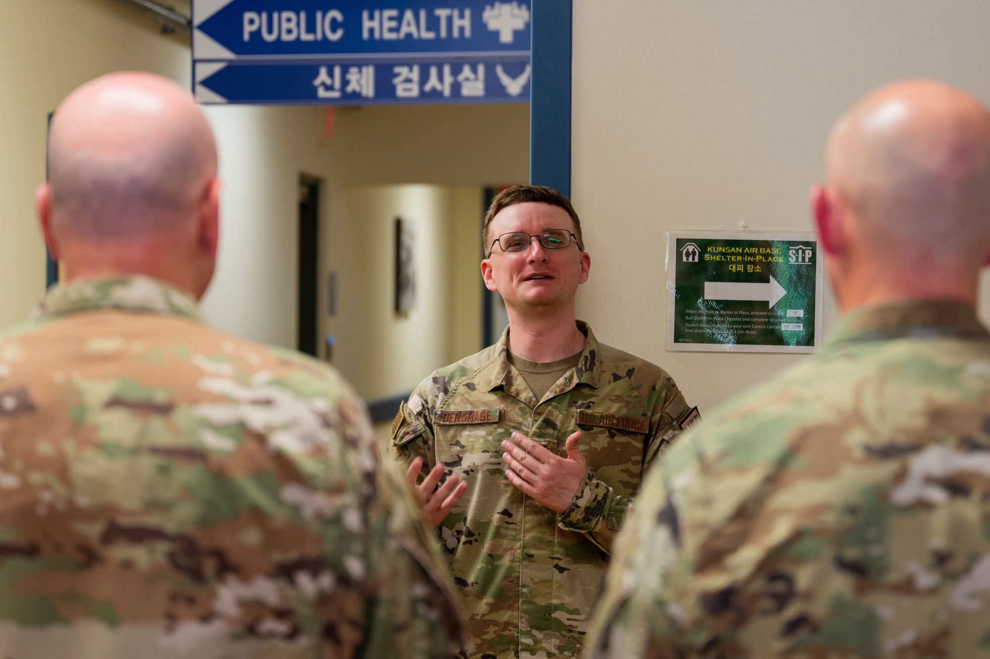 8th Healthcare Operations Squadron TRICARE operations and patient administration flight chief, briefs the Air Force Medical Readiness Agency commander, and chief of enlisted forces for AFMRA during their visit to Kunsan Air Base