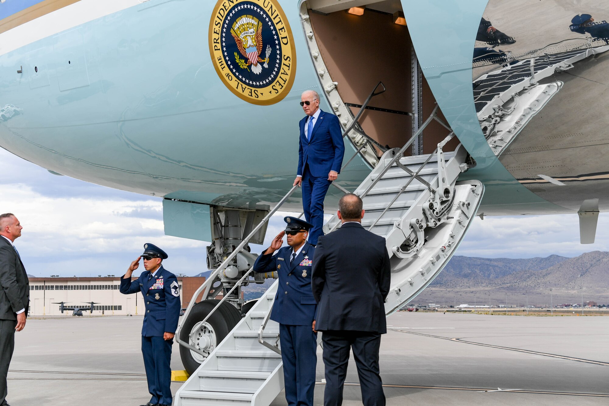 Man walking off a plane