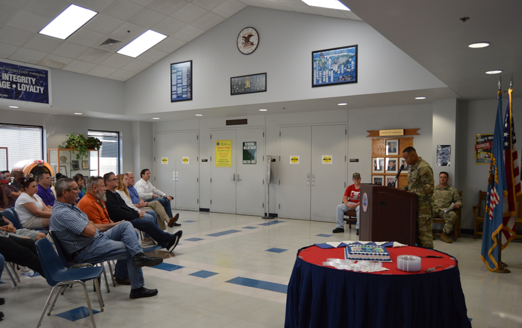 A commander addresses the civilian workforce.