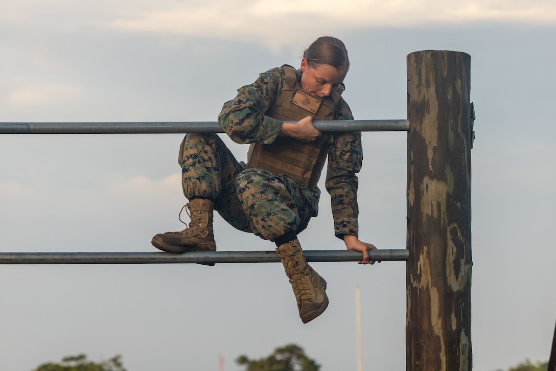 U.S. Marine Corps Sgt. Angelina Monnette, an engineer equipment operator with 2d Landing Support Battalion, 2d Marine Logistics Group, 2d Marine Division, conducts an obstacle course during a Martial Arts Instructor Course on Camp Lejeune, North Carolina, July 20, 2023. MAI Courses are designed to develop the individual Marine’s understanding of combative techniques while enduring both mental and physical stressors.