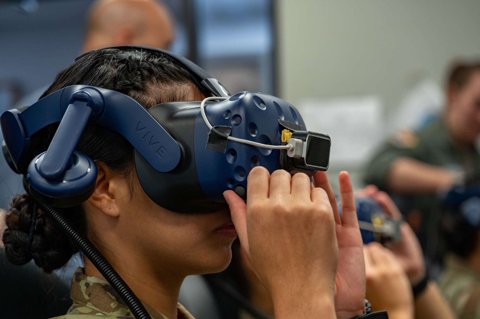 Air Force ROTC Academy Cadet Angelica Lumactod learns how to fly an F-15E Strike Eagle in a virtual reality training simulation at Seymour Johnson Air Force Base, North Carolina, August 3, 2023. This was part of a week-long tour aimed to enhance the cadets’ knowledge of Air Force career fields and a closer look at the base’s mission. (U.S. Air Force photo by Airman 1st Class Leighton Lucero)
