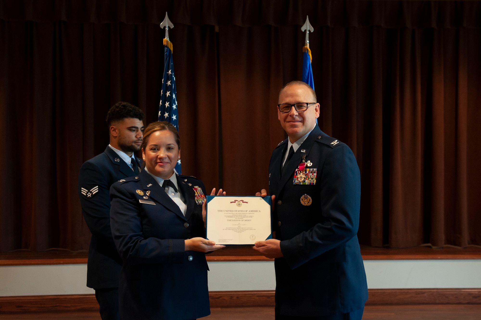 Col. Steven L. Watts II, outbound Geospatial and Signatures Intelligence Group commander, accepts the Legion of Merit award from Col. Ariel G. Batungbacal, National Air and Space Intelligence Center commander, during the group’s change of command ceremony at Wright-Patterson Air Force Base, Ohio, July 25, 2023. The Legion of Merit Medal is awarded for exceptionally meritorious conduct in the performance of outstanding services and achievements.