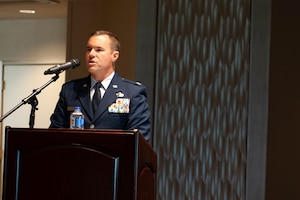 Col. Brandon Shade, incoming Geospatial and Signatures Intelligence Group commander, provides his first remarks as new commander following the groups change of command ceremony at Wright-Patterson Air Force Base, Ohio, July 25, 2023. In his remarks Shade said Col. Steven Watts, outgoing group commander, had set the bar high and looked forward to getting to work with the group.