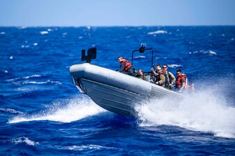 USS Normandy (CG 60) rigid-hull inflatable boat search-and-rescue training in the Ionian Sea.