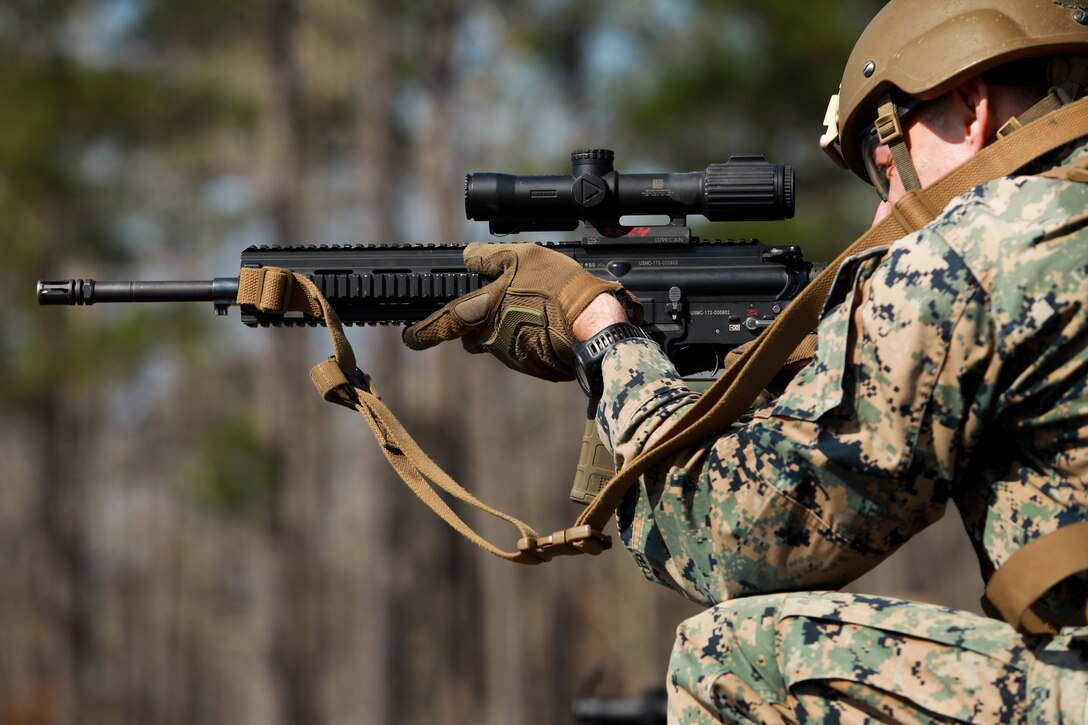 A U.S. Marine with the School of Infantry-East, Combat Instructor School, fires at targets while conducting a combat simulation at Camp Lejeune, N.C., Feb. 24, 2023. The Marine Corps Combat Instructor School trains and evaluates students based on their ability to perform and teach Marines with combat training. (U.S. Marine Corps photo by Lance Cpl. Zachary M. Candiani)