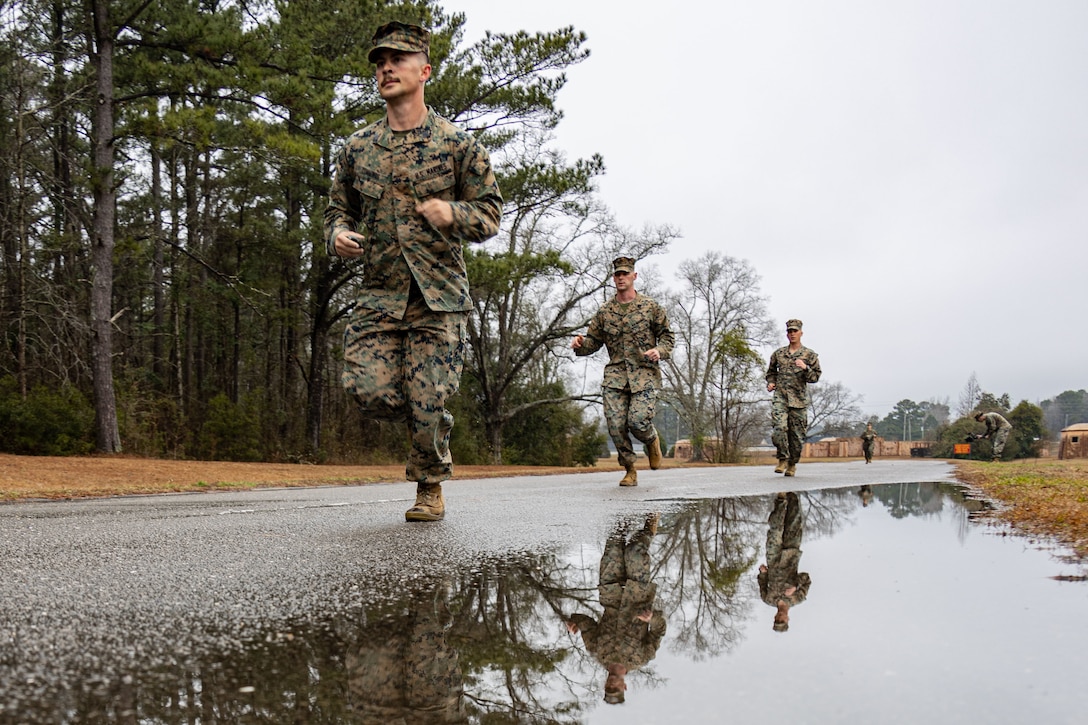 U.S. Marine Corps Sgt. Zacharias L. Cummings, a student with the School of Infantry-East, Combat Instructor School, determines a 100 meter pace count while training at Camp Geiger, N.C., Jan. 30, 2023. The Marine Corps Combat Instructor School course trains and evaluates students based on their ability to perform and teach Marines with Marine Combat Training. (U.S. Marine Corps photo by Lance Cpl. Alexis A. Ballin)
