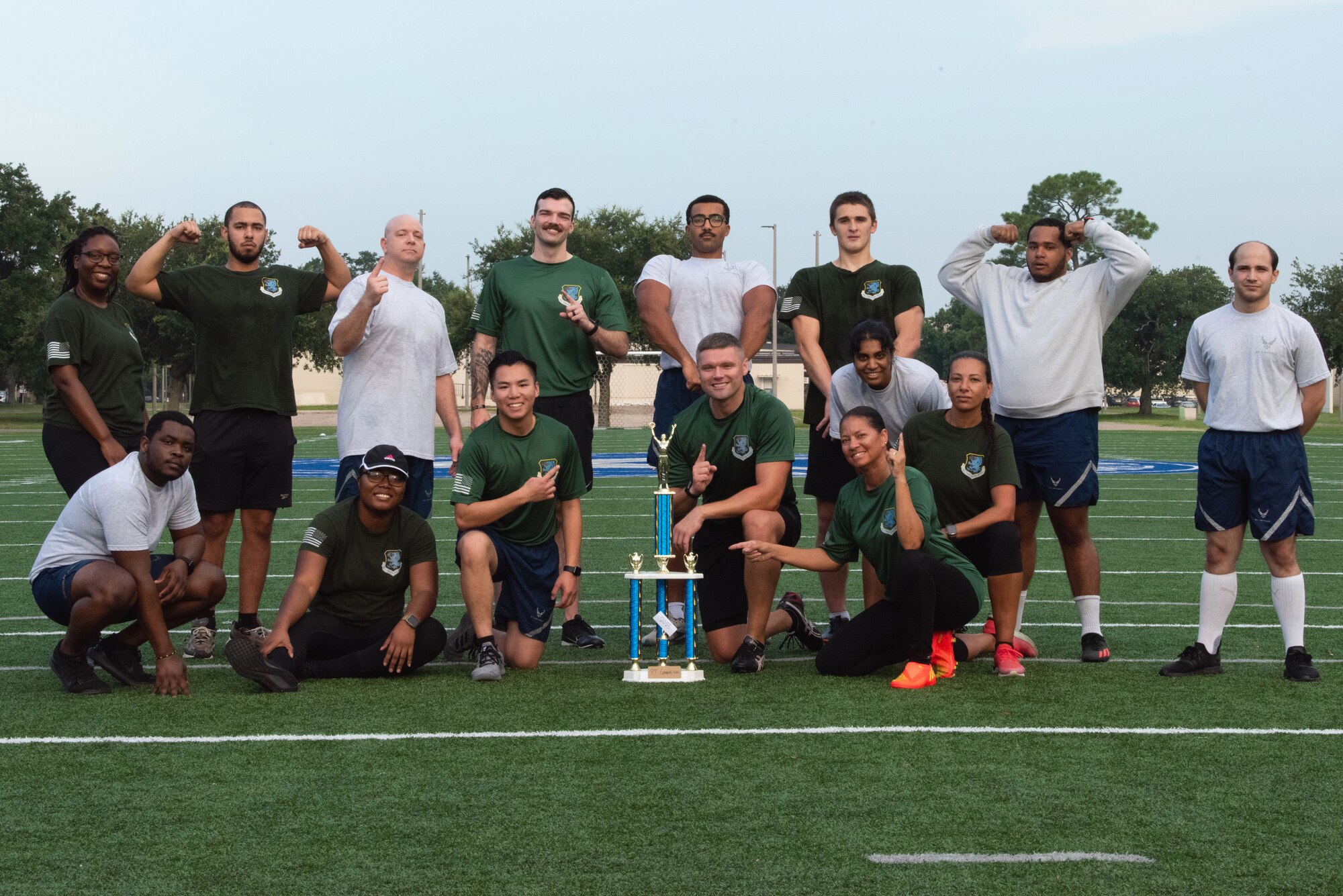 The 81st Comptroller Squadron poses for a group photo on the Multi-Purpose Turf Field at Keesler Air Force Base, Mississippi, July 28, 2023.