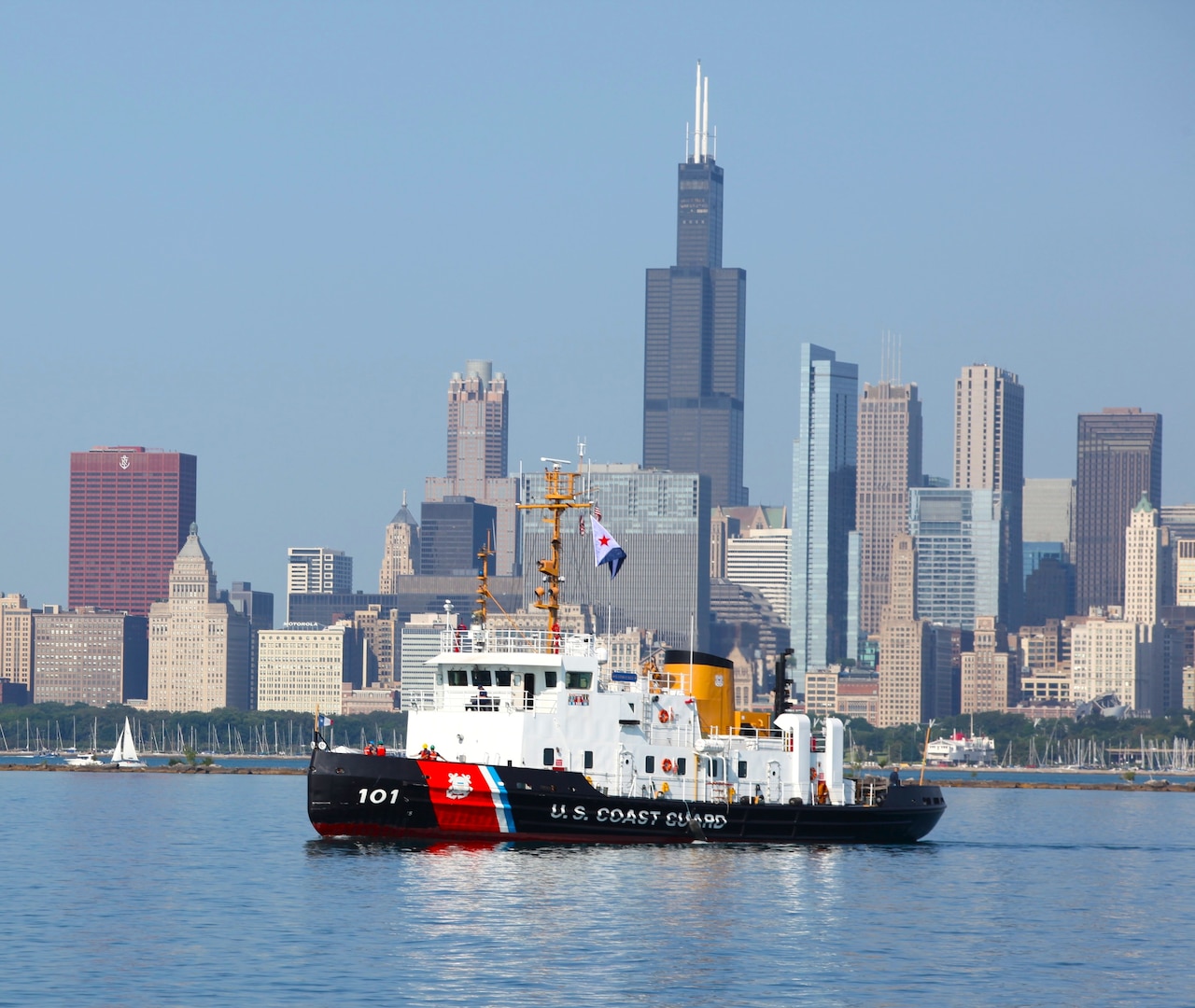 United States Coast Guard Cutter Katmai Bay anchored near Chicago on Lake Michigan during operations for the 2023 Chicago Yacht Club Race to Mackinac. (U.S. Coast Guard Auxiliary photo courtesy of Kurt Lentsch)