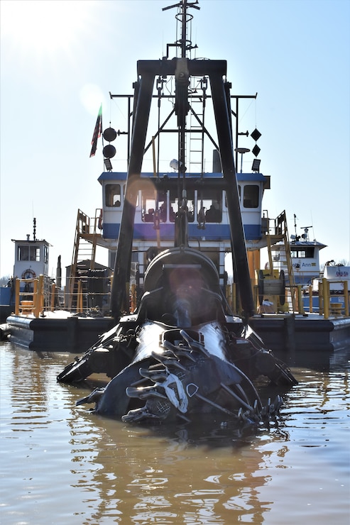 IN THE PHOTO, the Inland Dredging Company's cutterhead dredge "Integrity" works to dredge the Memphis Harbor/McKellar Lake, which was the last of 10 harbors dredged in the Memphis District during 2019. (USACE Photo / Jessica Haas)