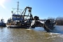 IN THE PHOTO, the Inland Dredging Company's cutterhead dredge "Integrity" works to dredge the Memphis Harbor/McKellar Lake, which was the last of 10 harbors dredged in the Memphis District during 2019. (USACE Photo / Jessica Haas)