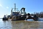 IN THE PHOTO, the Inland Dredging Company's cutterhead dredge "Integrity" works to dredge the Memphis Harbor/McKellar Lake, which was the last of 10 harbors dredged in the Memphis District during 2019. (USACE Photo / Jessica Haas)