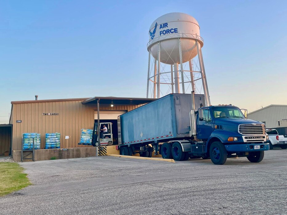 Pallets of water are offloaded at Goodfellow Air Force Base, Texas, July 19th, 2023. Members of the 17th Logistics Readiness Squadron worked to ensure all 37 pallets of water were promptly picked up from an off-base vendor prior to the warehouse closing. (Courtesy photo)