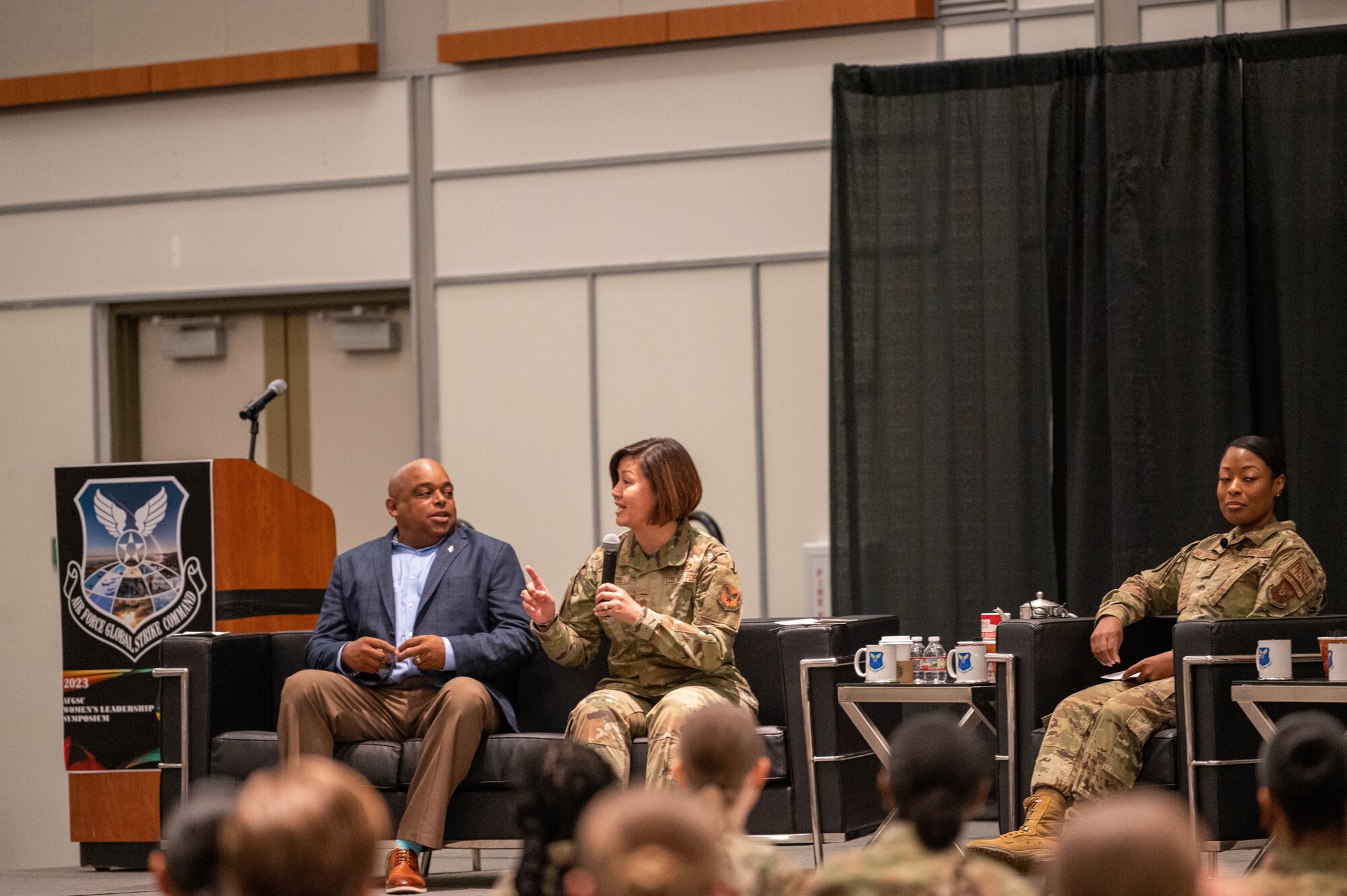 Chief Master Sgt. of the Air Force JoAnne S. Bass addresses attendees at the 2023 Air Force Global Strike Command Women's Leadership Symposium in Shreveport, La., July 25, 2023. Airmen and Guardians from AFGSC bases participated in the symposium virtually or in-person, discussing the importance of equity in leadership at all levels, and getting to hear from speakers and panels about the successes achieved and challenges experienced by women in the military. (U.S. Air Force photo by Capt. Joshua Thompson)