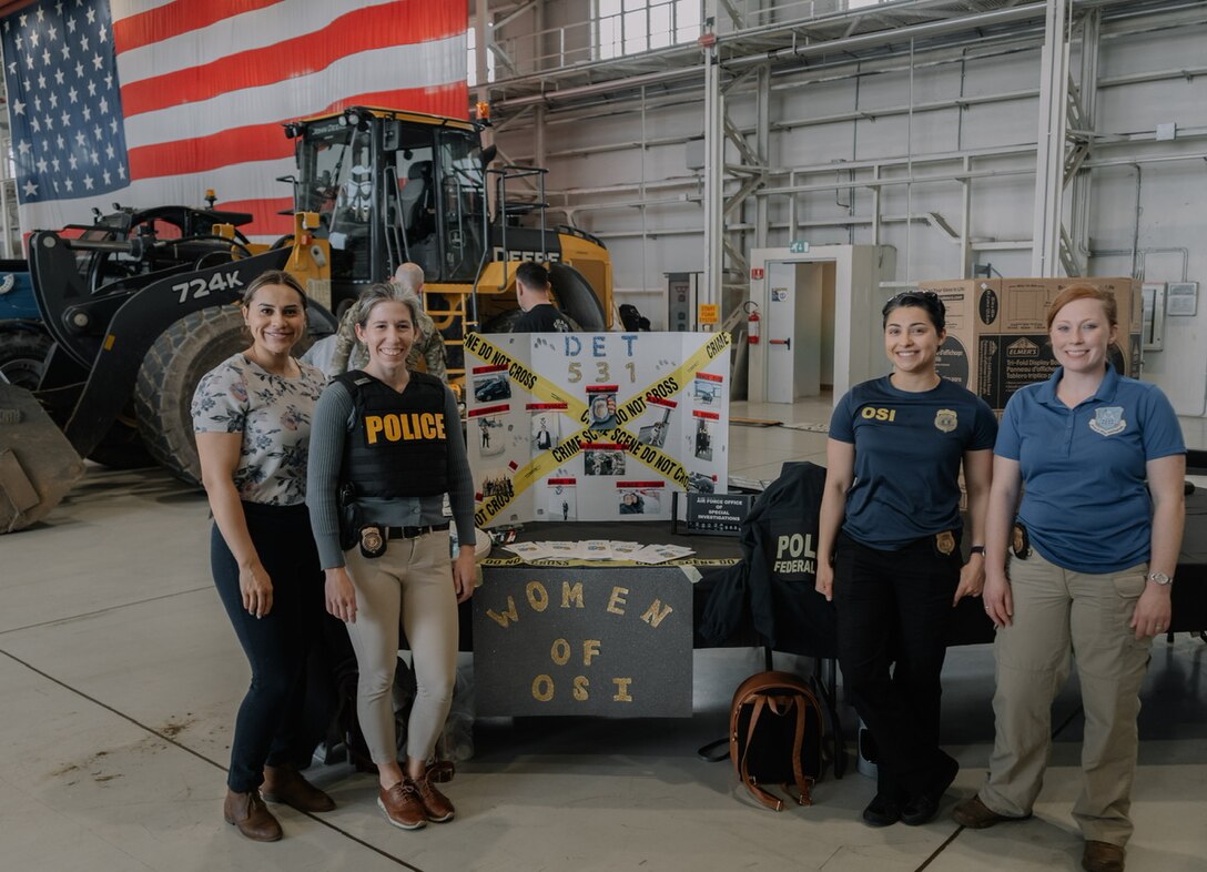 OSI Special Agents participate in the 2023 Women of Aviano which highlighted diverse opportunities for women in the local community. During the event, OSI Det. 531 interacted with over 300 attendees spanning all ages, careerfields and the base’s general population at their booth, which also displayed brochures and pictures of female Special Agents executing OSI's mission in the field. (Courtesy photo)