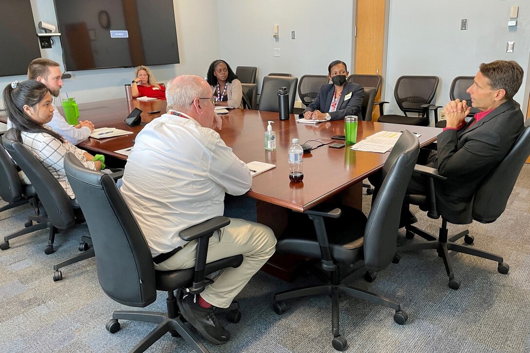 IMAGE: Naval Surface Warfare Center Dahlgren Division (NSWCDD) Dam Neck Activity's (DNA) Director David Richardson leads a small group discussion during a mentorship event, Aug. 1. The flash mentoring event titled, "So you want to be a senior leader," provided employees the opportunity to learn and speak with senior-level staff about their experiences and insight that helped them rise to their career milestones.